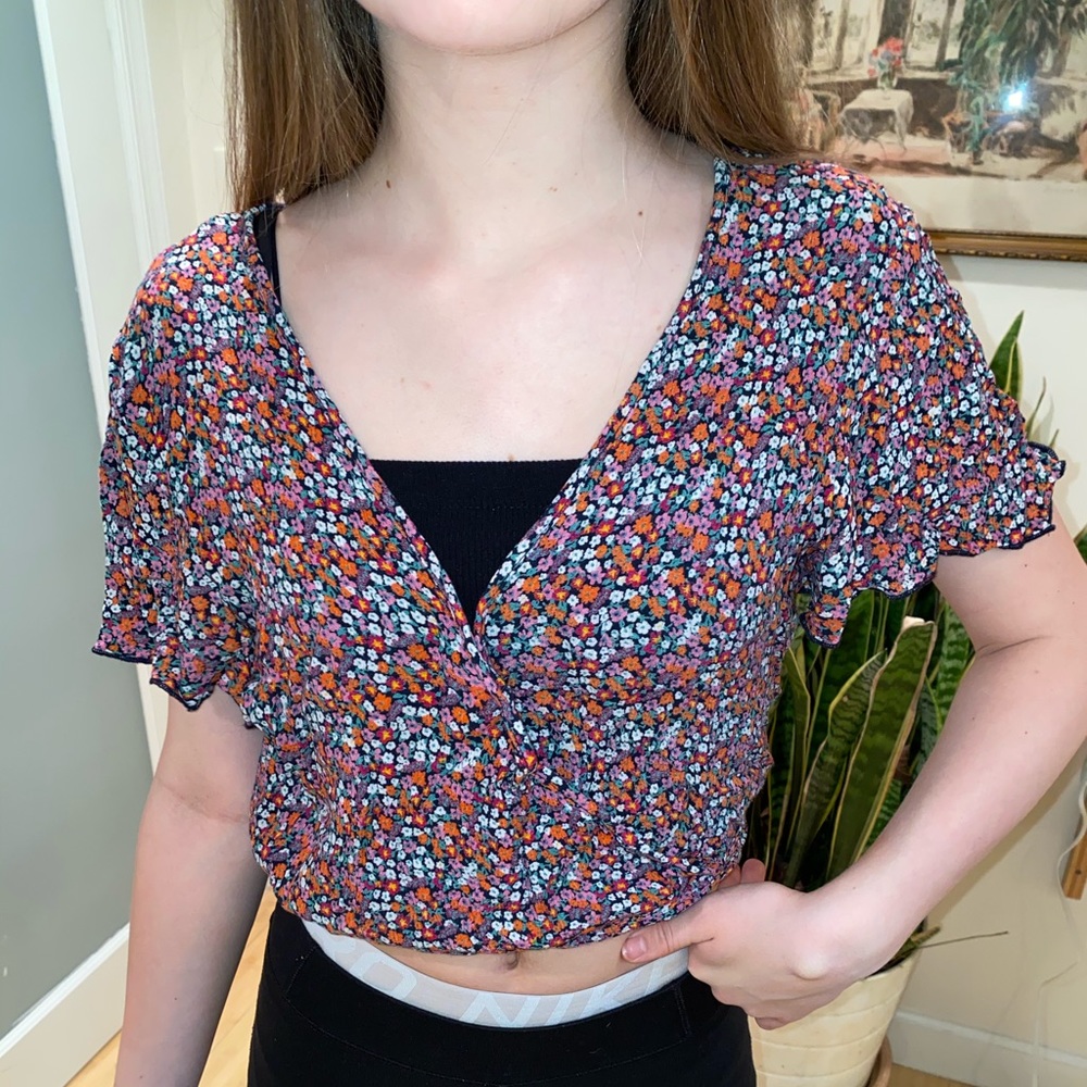 “patrons of peace” flowy cropped flower top